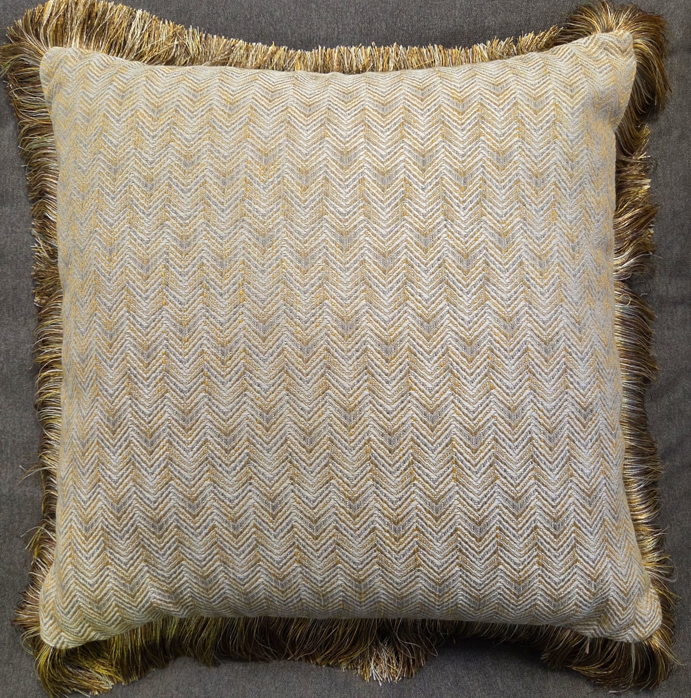 Gold and Cream Fabric with a 2" Shaggy/Shiny Fringe